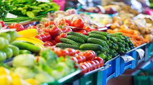 An image of different crops to be sold on a store shelf.